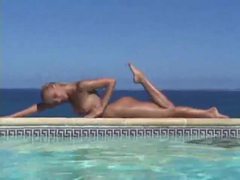 Find-Best-Tits.com presents: Blonde strips from bikini and takes a dip